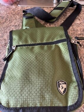 HEYS Olive Green Men's Sling Bag with Front Zip Pocket